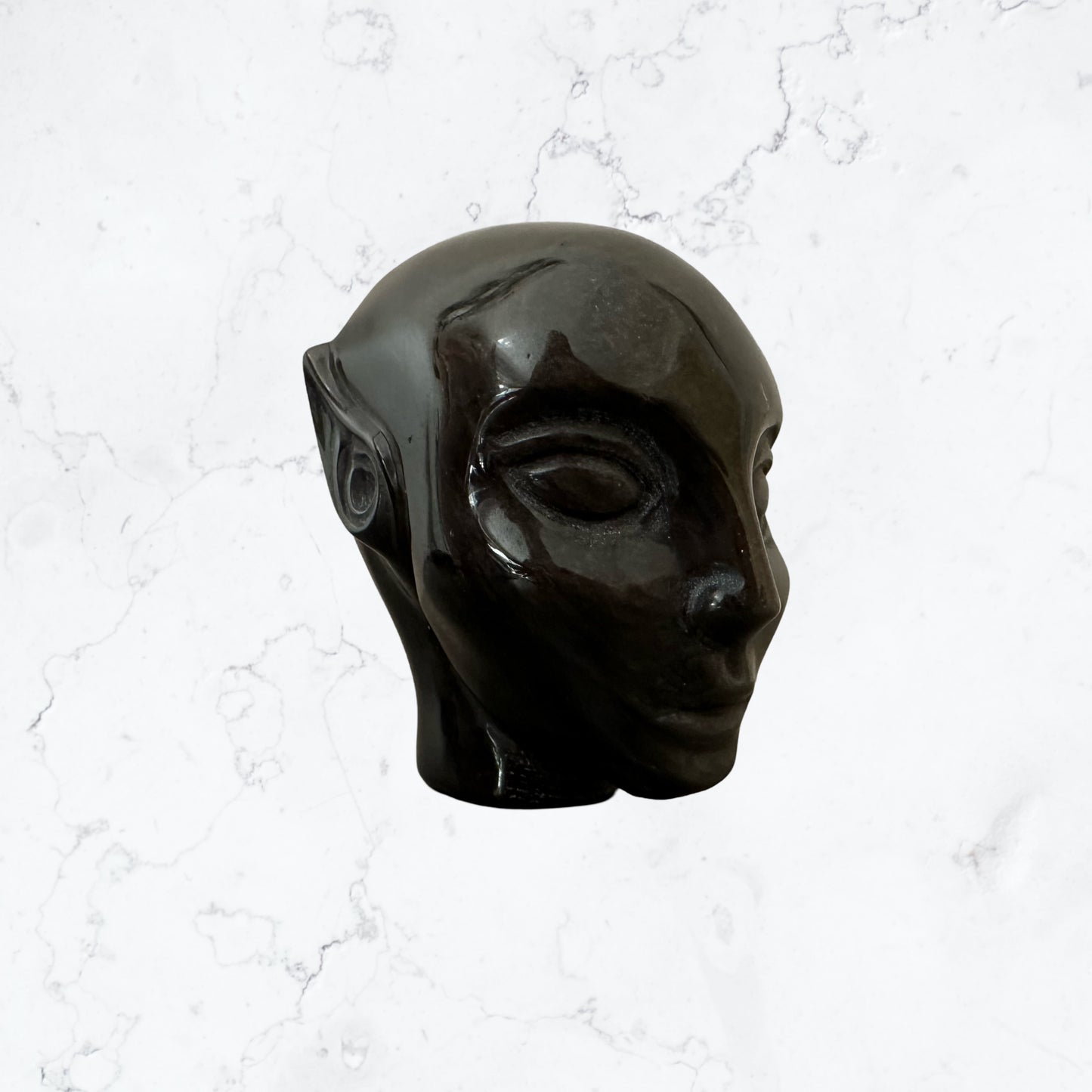 Golden sheen Obsidian Avatar carving