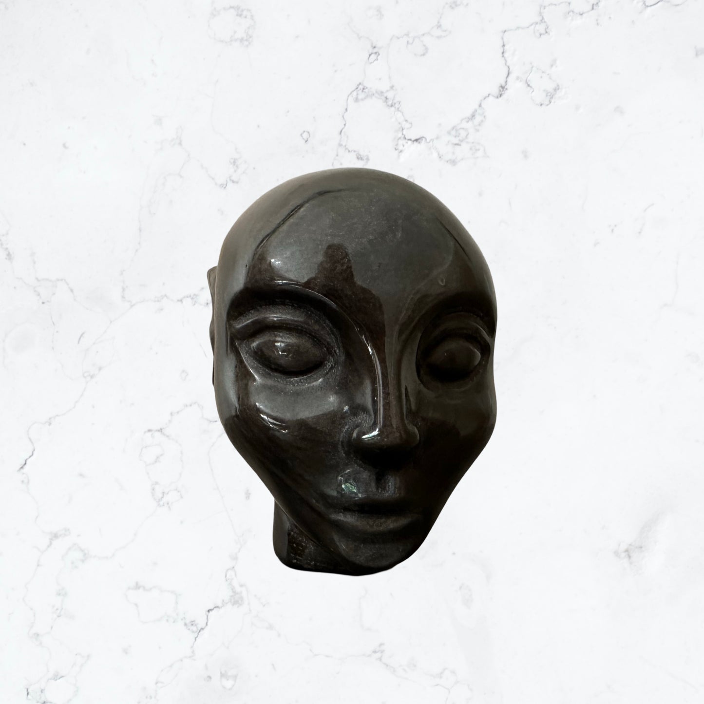 Golden sheen Obsidian Avatar carving