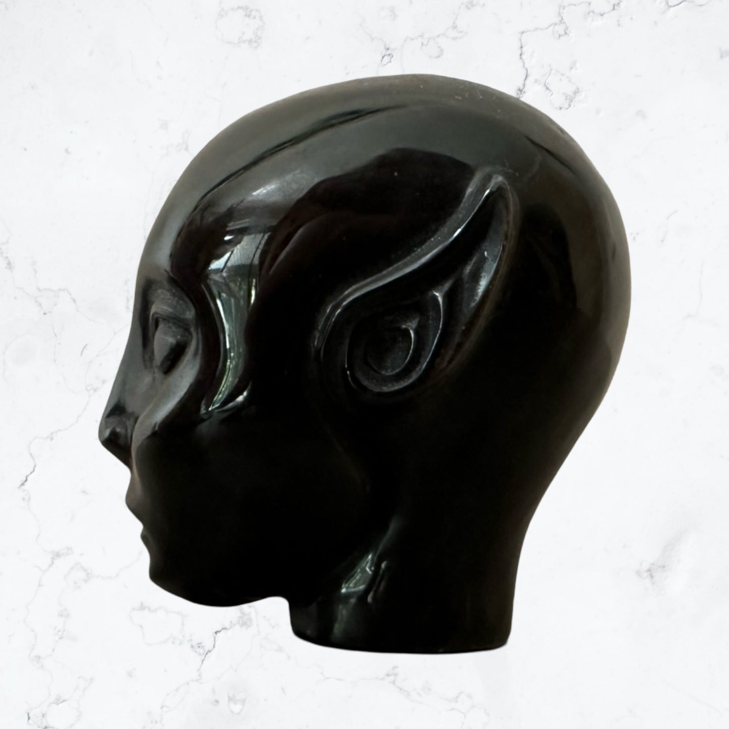 Golden sheen Obsidian Avatar carving