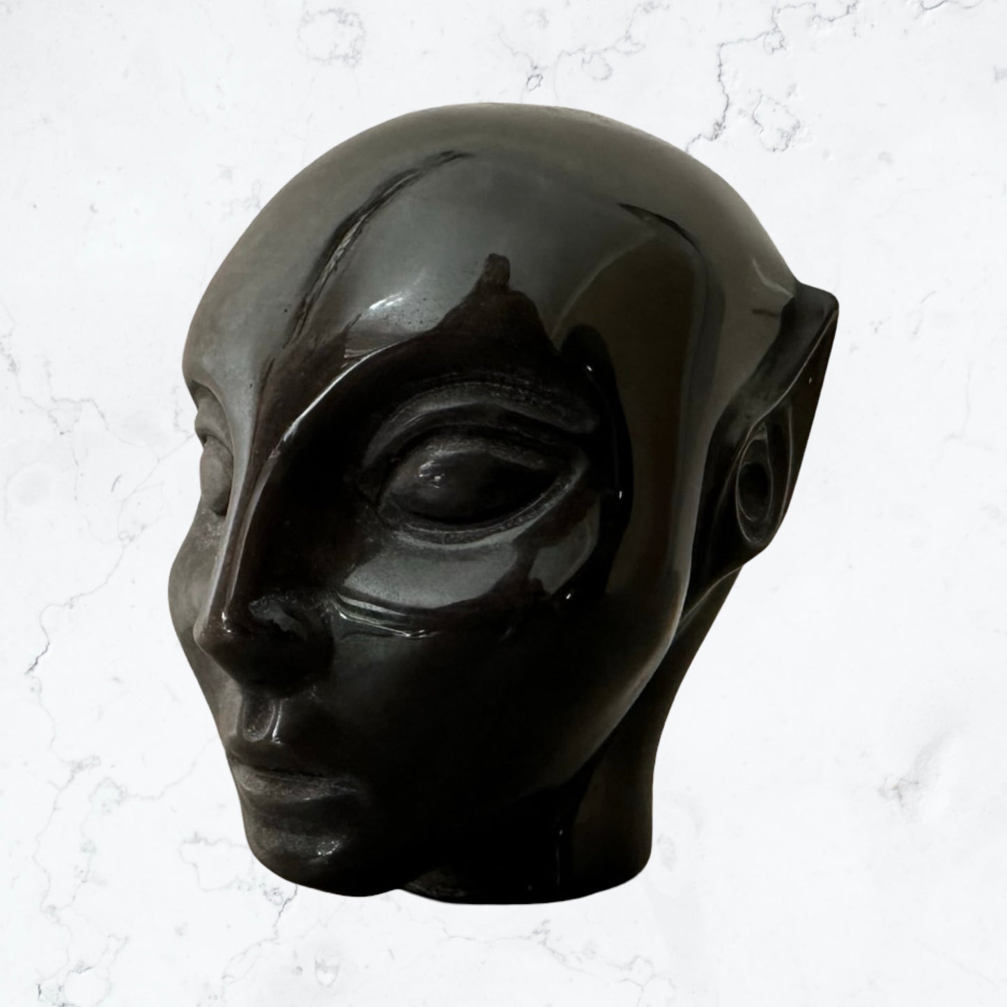 Golden sheen Obsidian Avatar carving