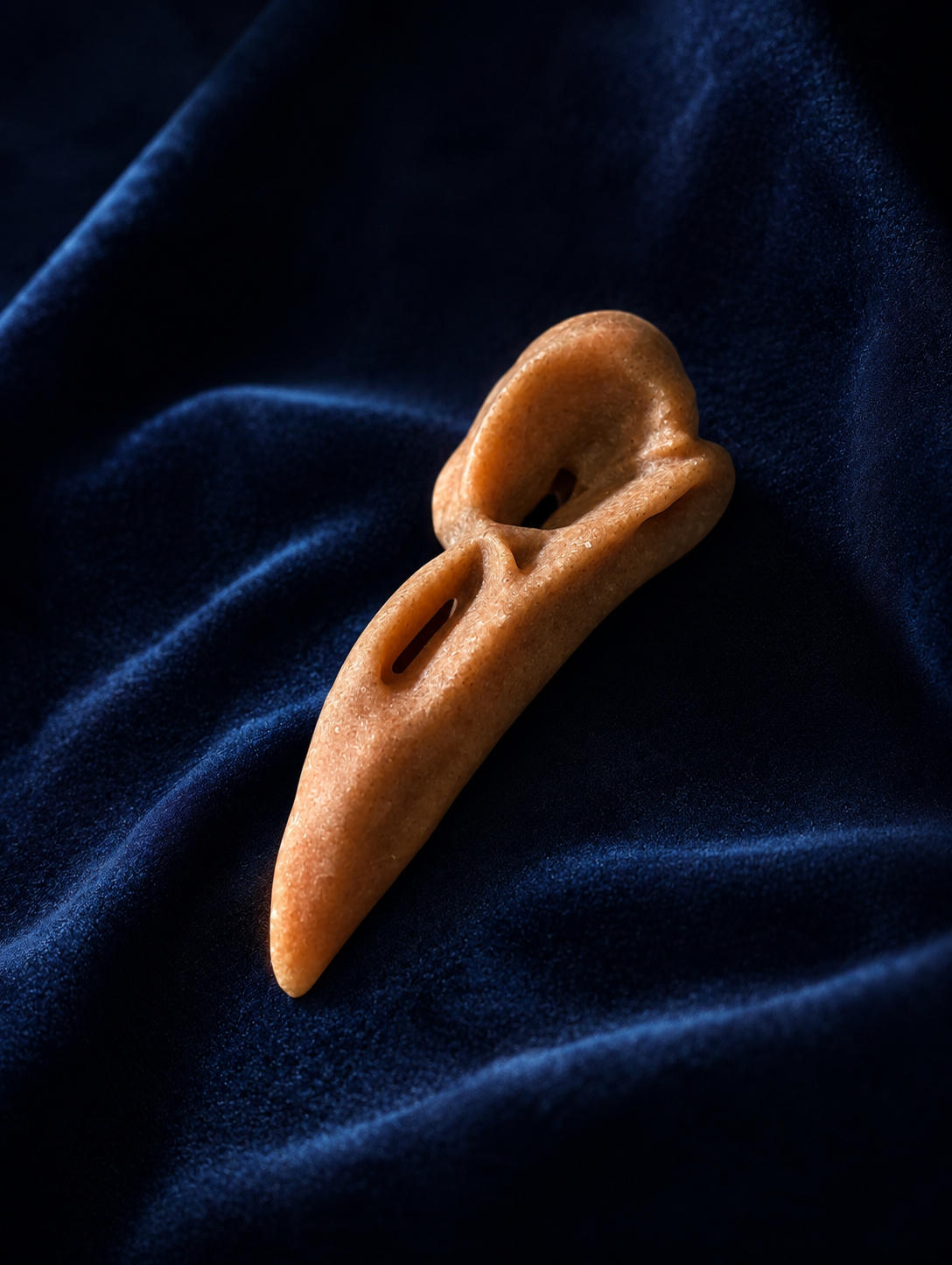 Hand-Carved Sunstone Raven Skull