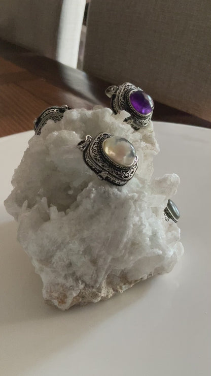 The Timekeepers Secret Flower Agate
Crystal Locket